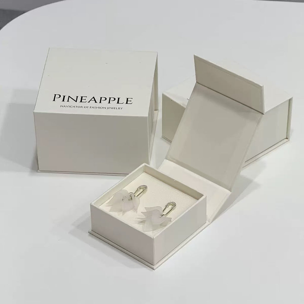 Custom book-style magnetic gift box with branded exterior